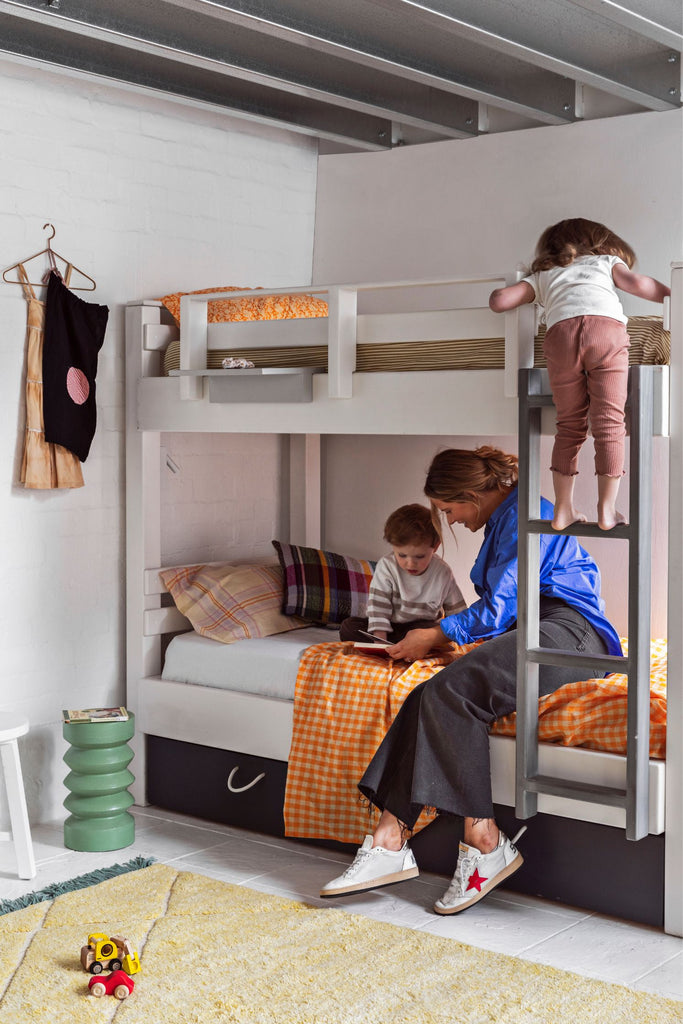 Mother with two kids in a Bunk Bed With 2x Half Storage